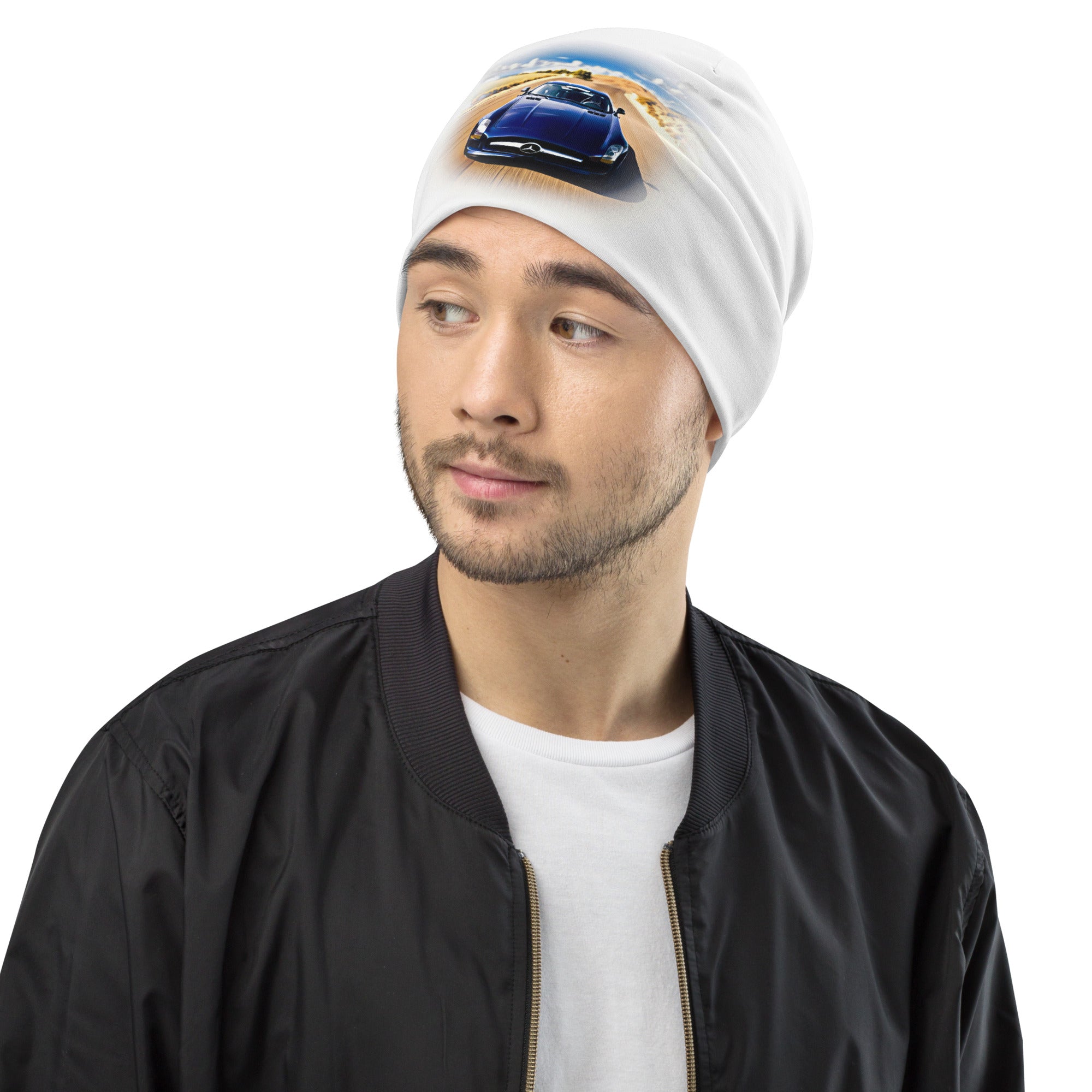 All-Over Print Beanie with car graphic; double-layered, soft and comfy, worn by man.